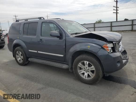 2011 Nissan Pathfinder Silver z VIN 5N1AR1NB1BC600498, wystawiony jako Copart lot #64841895 z przebiegiem 171 496 mil mil oraz Szkoda całkowita • Salvage title. Historia ofert i sprzedaży dostępna na DreamBid. Obrazek 4.