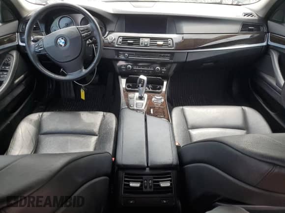 2013 BMW 5 Series 535i xDrive with VIN WBAFU7C5XDDU67159, listed as a Copart auction lot 68189065 with 161,702 mi miles and Salvage title. Bid and sale history available at DreamBid. Image 8.