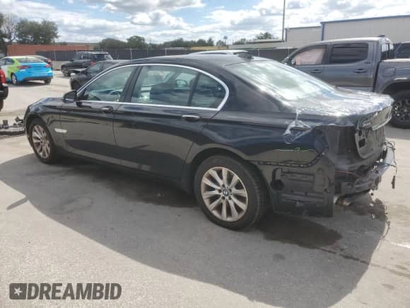 2013 BMW 7 Series 740Li xDrive with VIN WBAYF4C58DD127381, listed as a Copart auction lot 82588025 with 144,701 mi miles and Salvage title. Bid and sale history available at DreamBid. Image 2.
