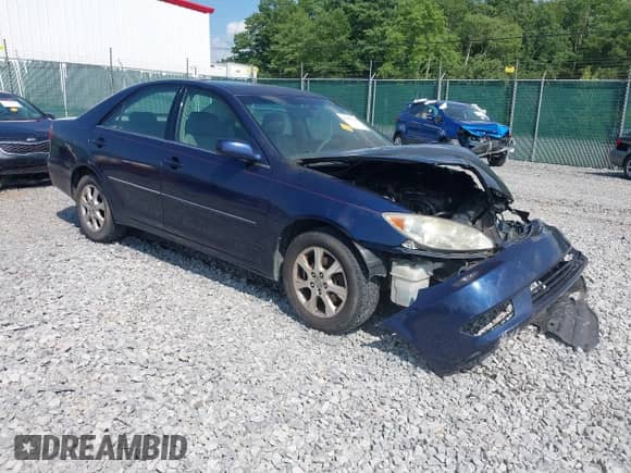 2005 Toyota Camry LE with VIN 4T1BF30K55U105946, listed as a IAAI auction lot 42567700 with Not provided miles and . Bid and sale history available at DreamBid. Image 1.