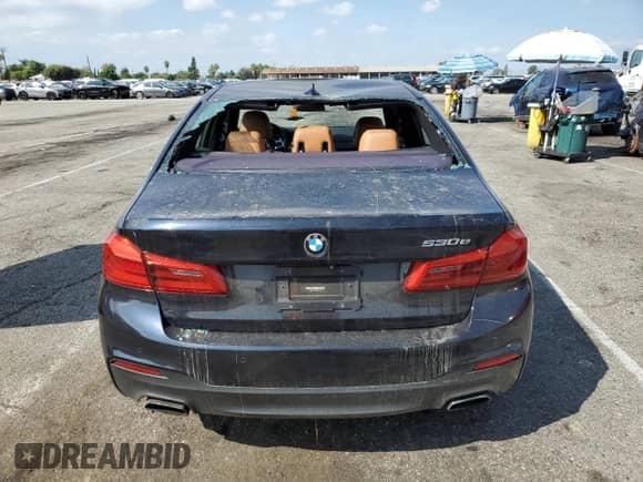 2019 BMW 5 Series 530e с VIN WBAJA9C54KB388173, выставлен на аукционе Copart как лот 81910625 с пробегом 114 665 миль миль и Списание • Salvage title. История ставок и продаж доступна на DreamBid. Изображение 6.