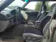 1999 Subaru Forester S with VIN JF1SF6557XH730701, listed as a Copart auction lot 65169235 with 142,246 mi miles and Salvage title. Bid and sale history available at DreamBid. Image 7.