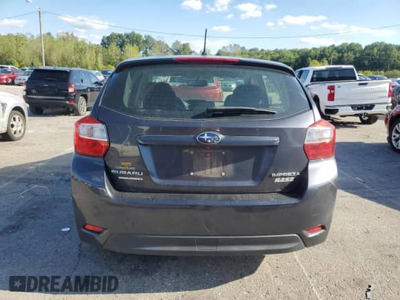 2014 Subaru Impreza Premium with VIN JF1GPAC67E8287593, listed as a Copart auction lot 82109635 with 73,638 mi miles and Salvage title. Bid and sale history available at DreamBid. Image 6.