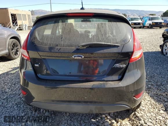 2011 Ford Fiesta SE with VIN 3FADP4EJ6BM181035, listed as a Copart auction lot 85318875 with 112,186 mi miles and Clean title. Bid and sale history available at DreamBid. Image 6.