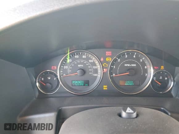 2006 Jeep Commander z VIN 1J8HH48K56C355688, wystawiony jako Copart lot #85169995 z przebiegiem 178 688 mil mil oraz Szkoda całkowita • Salvage title. Historia ofert i sprzedaży dostępna na DreamBid. Obrazek 9.