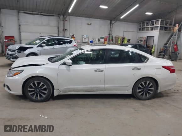 2016 Nissan Altima S with VIN 1N4AL3AP8GC231557, listed as a IAAI auction lot 42983363 with 104,867 mi miles and . Bid and sale history available at DreamBid. Image 15.