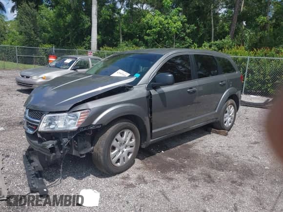 2013 Dodge Journey American Value z VIN 3C4PDCAB1DT710523, wystawiony jako IAAI lot #42997519 z przebiegiem 162 129 mil mil oraz . Historia ofert i sprzedaży dostępna na DreamBid. Obrazek 2.