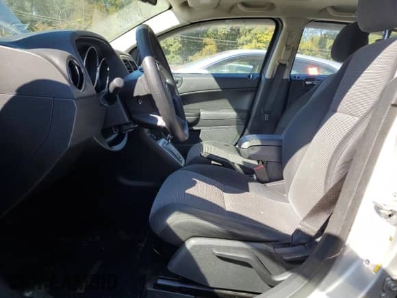 2010 Dodge Caliber Mainstreet with VIN 1B3CB3HA2AD615313, listed as a Copart auction lot 87078025 with 157,176 mi miles and Salvage title. Bid and sale history available at DreamBid. Image 7.