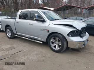 2014 Ram 1500 Big Horn z VIN 1C6RR7LM1ES370977, wystawiony jako IAAI lot #41037510 z przebiegiem 145 692 mil mil oraz . Historia ofert i sprzedaży dostępna na DreamBid. Obrazek 1.