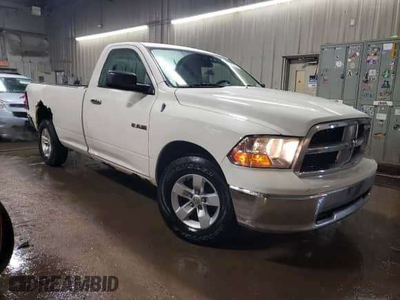 2009 Dodge 1500 SLT with VIN 1D3HB16P29J515765, listed as a Copart auction lot 43412785 with 345,710 mi miles and Salvage title. Bid and sale history available at DreamBid. Image 4.