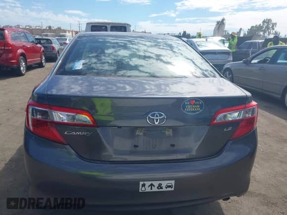 2014 Toyota Camry XLE with VIN 4T4BF1FK4ER441363, listed as a IAAI auction lot 43368571 with 122,544 mi miles and . Bid and sale history available at DreamBid. Image 16.
