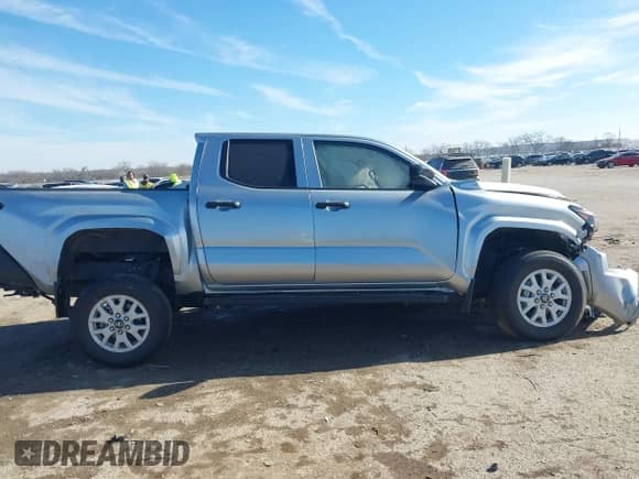 2024 Toyota Tacoma SR with VIN 3TYKD5HN4RT016047, listed as a IAAI auction lot 41335702 with Not provided miles and . Bid and sale history available at DreamBid. Image 13.