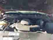 2002 Chevrolet Suburban LT z VIN 1GNEC16Z02J229078, wystawiony jako IAAI lot #41737482 z przebiegiem 306 502 mil mil oraz . Historia ofert i sprzedaży dostępna na DreamBid. Obrazek 10.