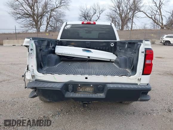 2018 Chevrolet Silverado 1500 Work Truck with VIN 1GCVKNEC7JZ121282, listed as a IAAI auction lot 41259105 with 82,746 mi miles and . Bid and sale history available at DreamBid. Image 17.