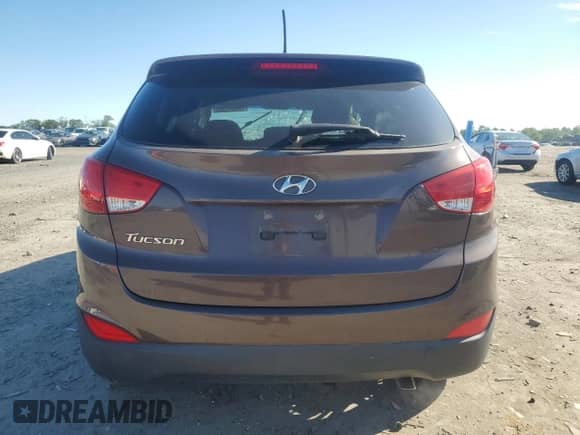 2014 Hyundai Tucson GLS with VIN KM8JT3AF2EU925312, listed as a Copart auction lot 58094795 with 88,275 mi miles and Salvage title. Bid and sale history available at DreamBid. Image 6.