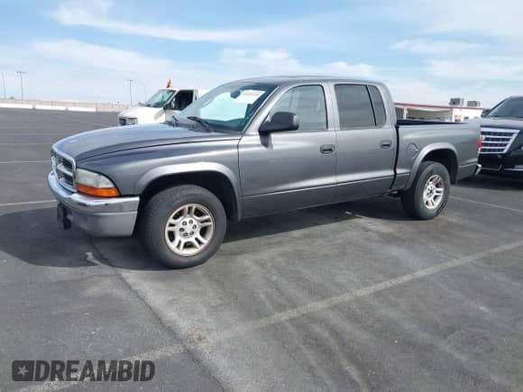 2003 Dodge Dakota SLT with VIN 1D7HL48N93S190381, listed as a IAAI auction lot 41921335 with 75,088 mi miles and . Bid and sale history available at DreamBid. Image 2.