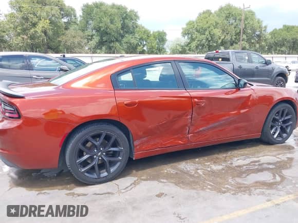 2021 Dodge Charger SXT with VIN 2C3CDXBG0MH532133, listed as a IAAI auction lot 43052102 with 165,802 mi miles and . Bid and sale history available at DreamBid. Image 13.