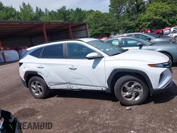 2023 Hyundai Tucson SEL with VIN 5NMJBCAE6PH199642, listed as a IAAI auction lot 42589398 with 52,526 mi miles and . Bid and sale history available at DreamBid. Image 13.