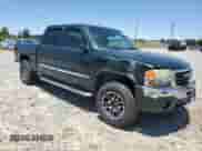 2006 GMC Sierra 1500 SLT with VIN 2GTEK13T661134911, listed as a Copart auction lot 56314755 with 320,552 mi miles and Salvage title. Bid and sale history available at DreamBid. Image 4.