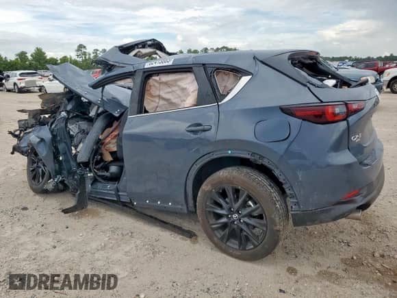 2023 Mazda CX-5 S Carbon Edition z VIN JM3KFBCM6P0124325, wystawiony jako Copart lot #62413885 z przebiegiem Nie podano mil oraz Szkoda całkowita • Salvage title. Historia ofert i sprzedaży dostępna na DreamBid. Obrazek 2.