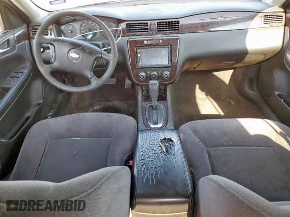 2013 Chevrolet Impala LS z VIN 2G1WF5E37D1262447, wystawiony jako Copart lot #69888965 z przebiegiem 234 923 mil mil oraz Szkoda całkowita • Salvage title. Historia ofert i sprzedaży dostępna na DreamBid. Obrazek 8.