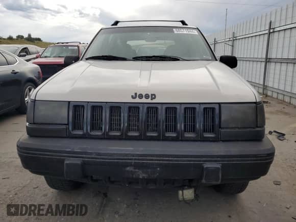 1995 Jeep Grand Cherokee Laredo with VIN 1J4GZ58S2SC703196, listed as a Copart auction lot 68571944 with 264,876 mi miles and Clean title. Bid and sale history available at DreamBid. Image 5.
