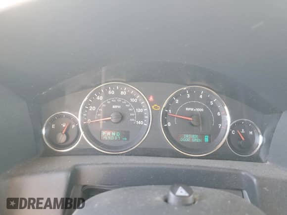 2007 Jeep Commander Sport z VIN 1J8HG48K27C567128, wystawiony jako Copart lot #80455145 z przebiegiem 159 037 mil mil oraz Szkoda całkowita • Salvage title. Historia ofert i sprzedaży dostępna na DreamBid. Obrazek 9.