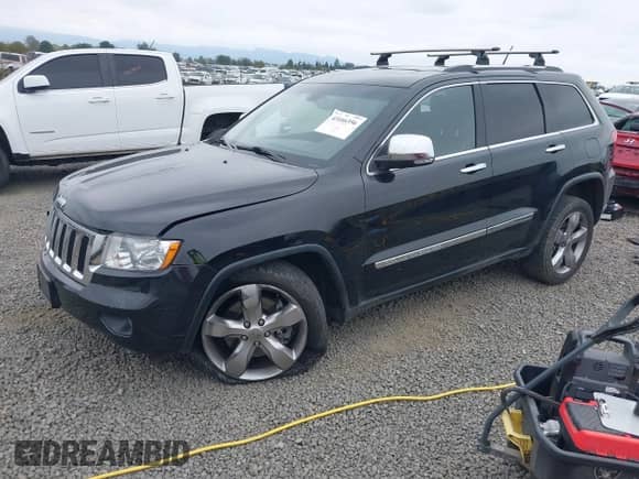 2013 Jeep Grand Cherokee Limited z VIN 1C4RJFBT4DC503856, wystawiony jako IAAI lot #43166356 z przebiegiem 143 262 mil mil oraz . Historia ofert i sprzedaży dostępna na DreamBid. Obrazek 2.