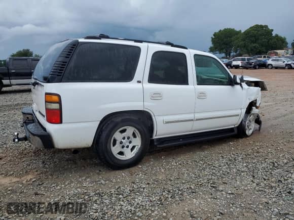 2004 Chevrolet Tahoe LT z VIN 1GNEC13Z64R150152, wystawiony jako Copart lot #63641075 z przebiegiem Nie podano mil oraz Szkoda całkowita • Salvage title. Historia ofert i sprzedaży dostępna na DreamBid. Obrazek 3.