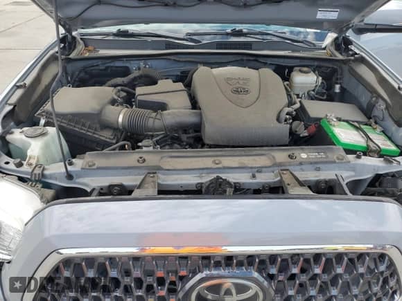2019 Toyota Tacoma TRD Off Road z VIN 3TMCZ5AN7KM210332, wystawiony jako Copart lot #81743135 z przebiegiem 90 681 mil mil oraz Szkoda całkowita • Salvage title. Historia ofert i sprzedaży dostępna na DreamBid. Obrazek 11.