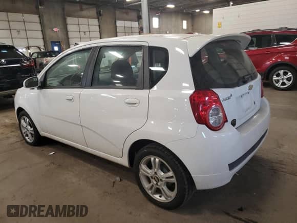 2011 Chevrolet Aveo LS z VIN KL1TD6DE3BB115412, wystawiony jako Copart lot #81599074 z przebiegiem 71 607 mil mil oraz Czysty tytuł • Clean title. Historia ofert i sprzedaży dostępna na DreamBid. Obrazek 2.