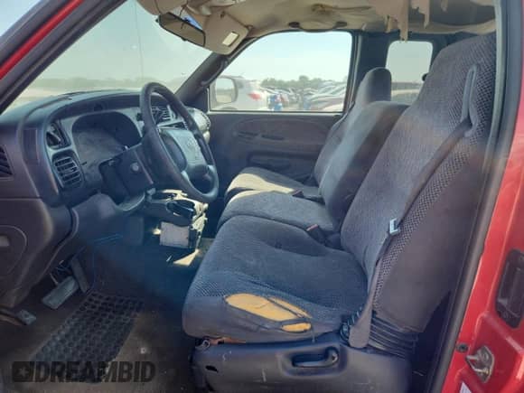 2001 Dodge 1500 z VIN 1B7HC13Y21J290075, wystawiony jako Copart lot #72085035 z przebiegiem Nie podano mil oraz Szkoda całkowita • Salvage title. Historia ofert i sprzedaży dostępna na DreamBid. Obrazek 7.