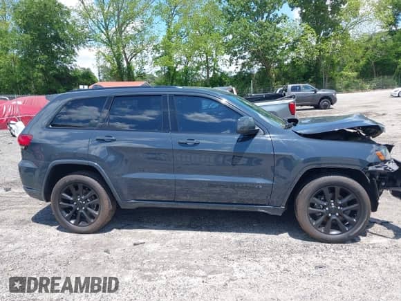 2018 Jeep Grand Cherokee Laredo E z VIN 1C4RJEAG7JC183748, wystawiony jako IAAI lot #42192748 z przebiegiem 186 626 mil mil oraz . Historia ofert i sprzedaży dostępna na DreamBid. Obrazek 13.
