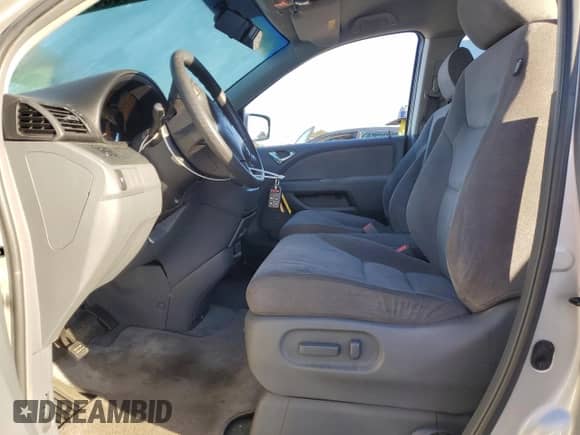 2005 Honda Odyssey EX с VIN 5FNRL38475B413498, выставлен на аукционе Copart как лот 86595645 с пробегом 63 930 миль миль и Списание • Salvage title. История ставок и продаж доступна на DreamBid. Изображение 7.