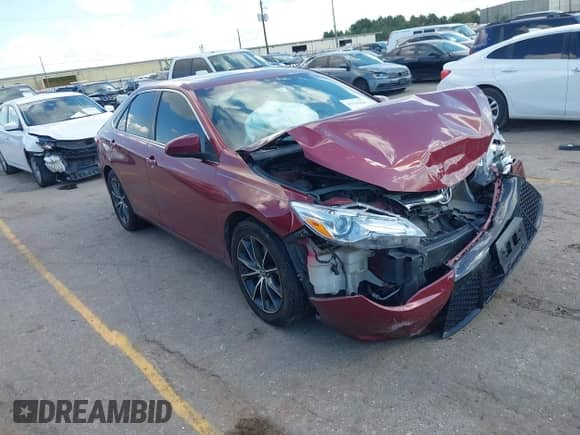 2015 Toyota Camry XSE with VIN 4T1BK1FK9FU564244, listed as a IAAI auction lot 43399841 with 236,960 mi miles and . Bid and sale history available at DreamBid. Image 1.