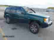 1998 Jeep Grand Cherokee Laredo с VIN 1J4GZ58S0WC245020, выставлен на аукционе IAAI как лот 43257309 с пробегом 226 092 миль миль и . История ставок и продаж доступна на DreamBid. Изображение 1.