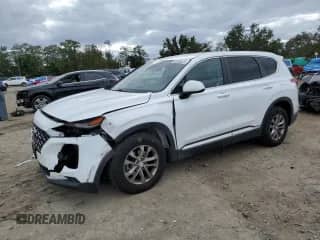 2019 Hyundai Santa Fe SE с VIN 5NMS2CAD5KH114018, выставлен на аукционе Copart как лот 85930475 с пробегом 79 748 миль миль и Списание • Salvage title. История ставок и продаж доступна на DreamBid. Изображение 1.