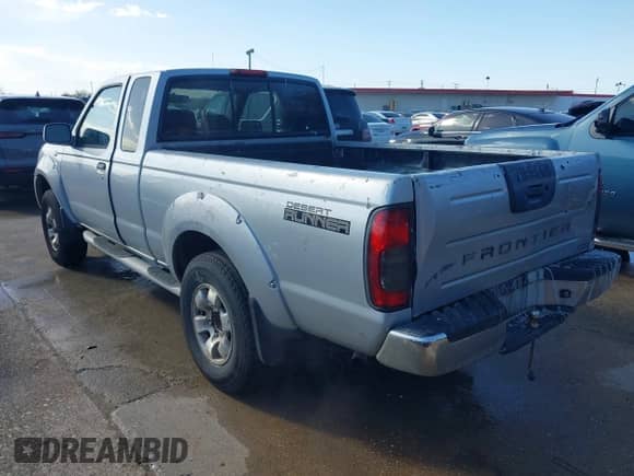 2001 Nissan Frontier SE Desert Runner z VIN 1N6ED26T31C335077, wystawiony jako IAAI lot #41716733 z przebiegiem 308 298 mil mil oraz . Historia ofert i sprzedaży dostępna na DreamBid. Obrazek 3.