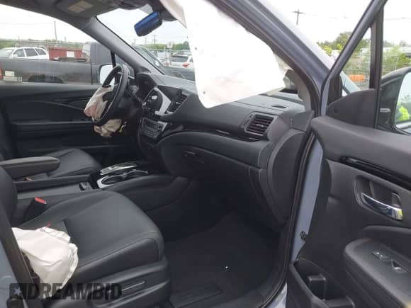 2022 Honda Pilot Touring 7-Passenger z VIN 5FNYF6H68NB056077, wystawiony jako IAAI lot #42357338 z przebiegiem 18 193 mil mil oraz . Historia ofert i sprzedaży dostępna na DreamBid. Obrazek 5.