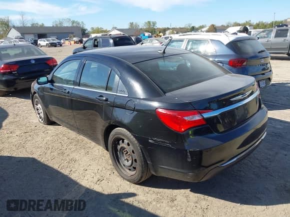2014 Chrysler 200 LX with VIN 1C3CCBAB0EN194740, listed as a IAAI auction lot 43406828 with 202,482 mi miles and . Bid and sale history available at DreamBid. Image 3.