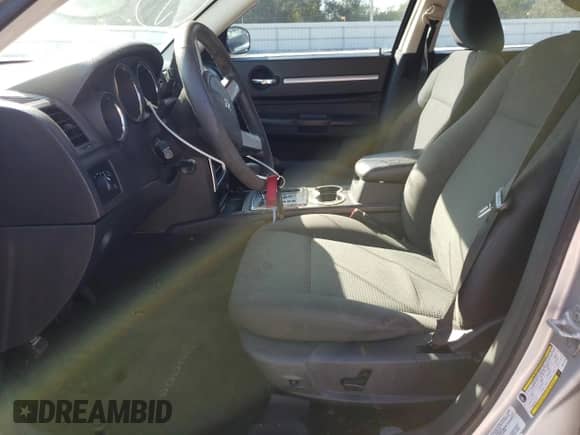 2010 Dodge Charger SXT с VIN 2B3CA3CV2AH271126, выставлен на аукционе Copart как лот 66875073 с пробегом 221 933 миль миль и Списание • Salvage title. История ставок и продаж доступна на DreamBid. Изображение 7.