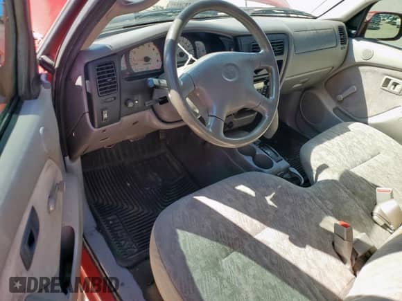 2004 Toyota Tacoma PreRunner with VIN 5TENM92N74Z464206, listed as a Copart auction lot 84038115 with 217,428 mi miles and Salvage title. Bid and sale history available at DreamBid. Image 8.