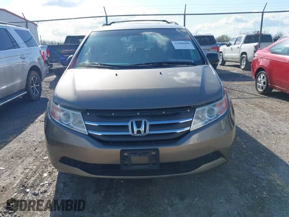 2012 Honda Odyssey LX z VIN 5FNRL5H29CB091860, wystawiony jako IAAI lot #42000688 z przebiegiem 295 551 mil mil oraz . Historia ofert i sprzedaży dostępna na DreamBid. Obrazek 6.