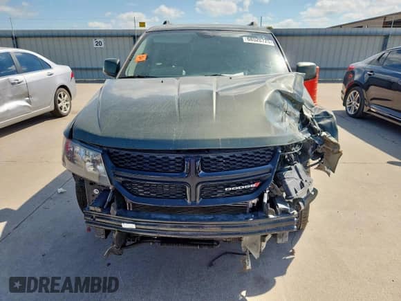 2017 Dodge Journey Crossroad with VIN 3C4PDCGG5HT606562, listed as a Copart auction lot 68520725 with 138,030 mi miles and Salvage title. Bid and sale history available at DreamBid. Image 5.