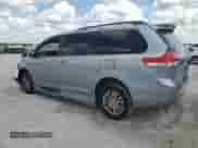 2012 Toyota Sienna XLE with VIN 5TDYK3DC6CS235796, listed as a Copart auction lot 70565525 with 120,990 mi miles and Clean title. Bid and sale history available at DreamBid. Image 2.