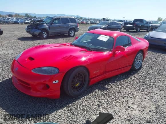 2002 Dodge Viper GTS with VIN 1B3ER69EX2V101020, listed as a IAAI auction lot 42003496 with 62,416 mi miles and . Bid and sale history available at DreamBid. Image 2.