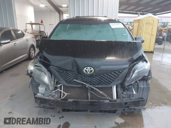 2014 Toyota Sienna SE with VIN 5TDXK3DC5ES456630, listed as a IAAI auction lot 42370657 with 164,633 mi miles and . Bid and sale history available at DreamBid. Image 12.