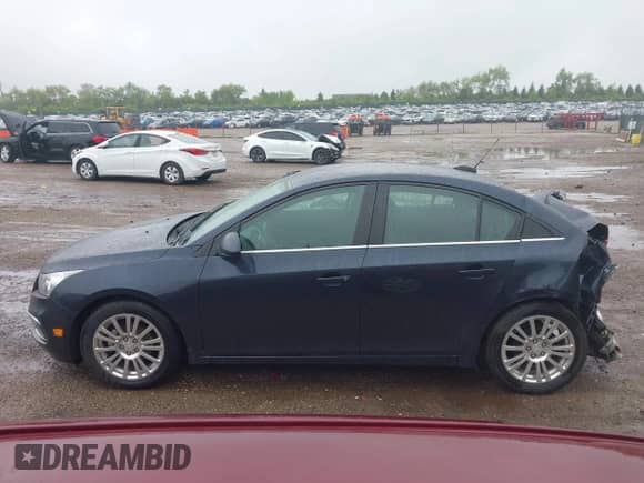 2015 Chevrolet Cruze ECO z VIN 1G1PH5SB8F7130975, wystawiony jako IAAI lot #42270338 z przebiegiem 160 897 mil mil oraz . Historia ofert i sprzedaży dostępna na DreamBid. Obrazek 15.
