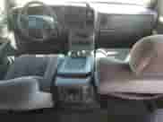 2005 GMC Sierra 1500 SLT z VIN 2GTEK13T051170186, wystawiony jako Copart lot #69706105 z przebiegiem 292 678 mil mil oraz Czysty tytuł • Clean title. Historia ofert i sprzedaży dostępna na DreamBid. Obrazek 8.