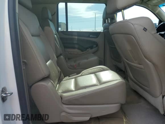 2015 Chevrolet Suburban LTZ с VIN 1GNSCKKC8FR278854, выставлен на аукционе Copart как лот 68830435 с пробегом 200 983 миль миль и Списание • Salvage title. История ставок и продаж доступна на DreamBid. Изображение 11.